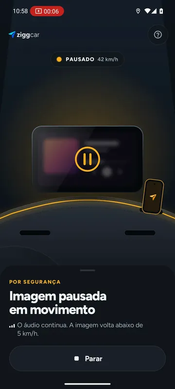 Captura real da central com a imagem pausada por segurança e o aviso: o áudio continua