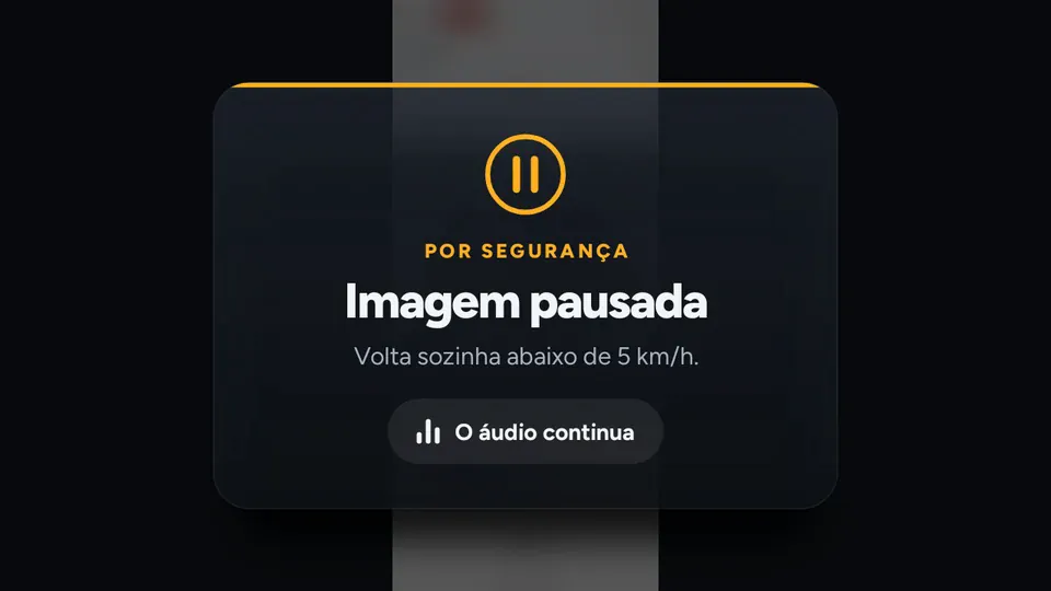 Captura real da central com a imagem pausada por segurança e o aviso: o áudio continua